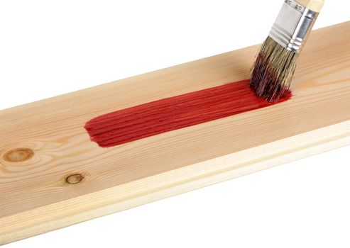 painted wooden board with red paint