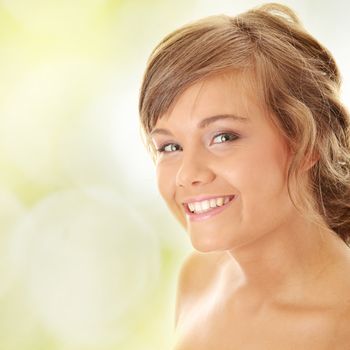 Close-up, portrait of a beautiful woman getting ready for the spa treatment