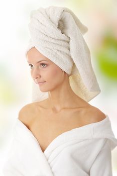 Relax concept:  beautiful nude woman with soft skin in bathrob