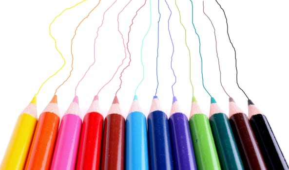 A metaphorical image of random scribbled lines by a team of colorful pencils, on a white surface.