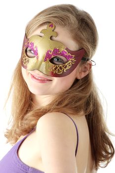Young beautiful woman in violet dress wearing carnival mask, isolated