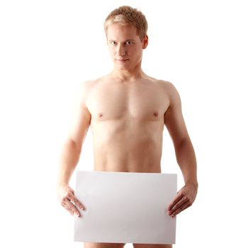 Young muscular nude man covering a copy space blank billboard isolated on white