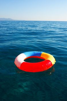 swim ring floating on beautiful blue water