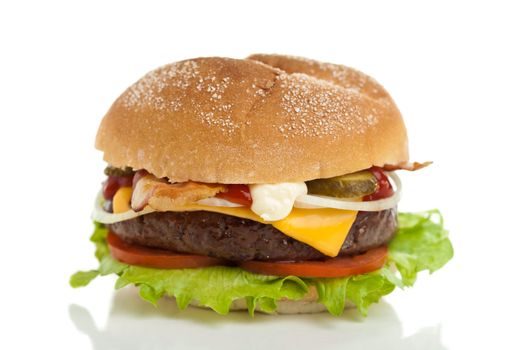 Delicious big cheeseburger on white background