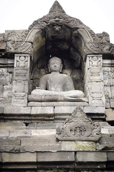 Indonesian buddha statue in Prambanan temple site