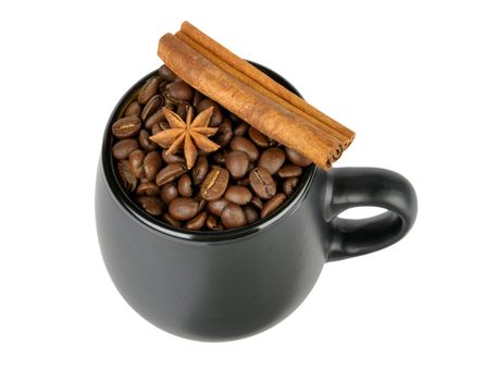 coffee beans and spices in a mug