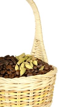 Coffee and cardamom in a basket ,isolated on a white