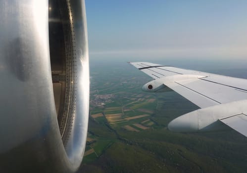 Flying plane wing and motor upon fields