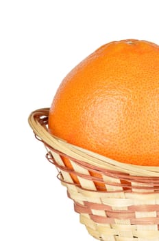 grapefruit in the basket isolated on a white background