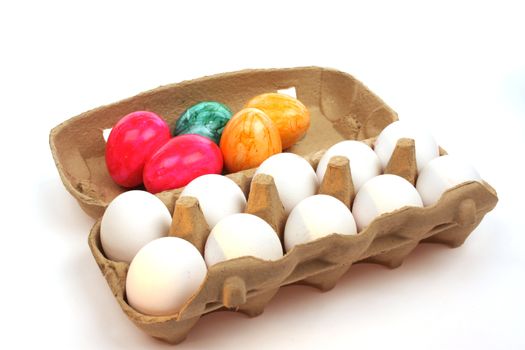Eggs in a box isolated against a whithe backgroud