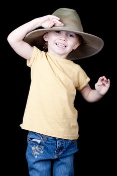 A girl is saluting with her oversized hat.  She is saying Aye Mate!