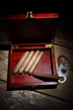 cigars in the box , close up over vintage table