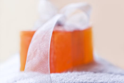 Handmade soap and towel in a spa - very shallow depth of field