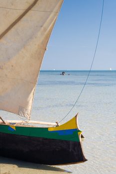 Malagasy outrigger pirogue with makeshift sails