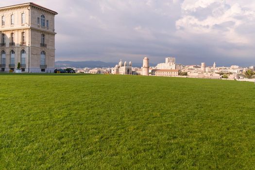 Medieval Fortress and cathedral front lawn in Marseille France