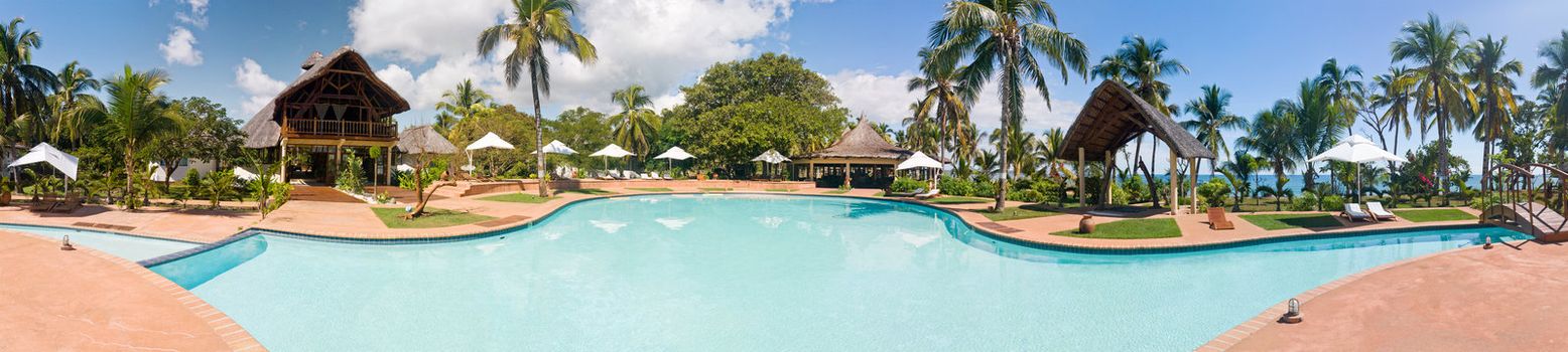 Panorama swimming pool of a luxurious tropical hotel