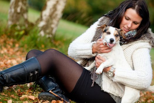 Happy girl with her Jack Russell Terrier