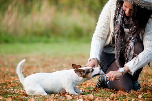 Happy girl with her Jack Russell Terrier