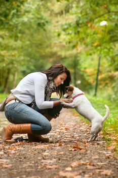 Happy girl with her Jack Russell Terrier