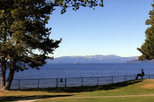 Adult man on vacation at a lake Tahoe