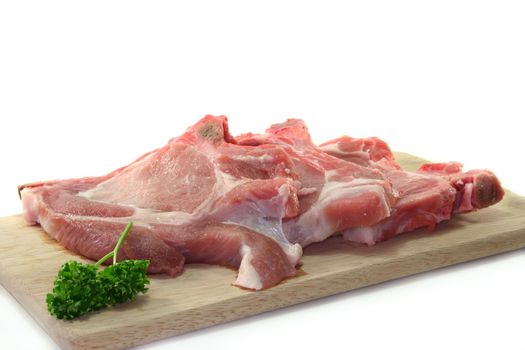 raw chops on a white background