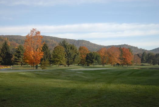 A fall scene at a mountain golf course