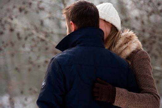 two lovers enjoying the winter