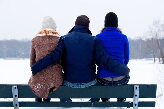 trio enjoying a wintery day in the park