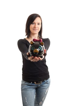 a young woman presenting a piggy bank to the camera