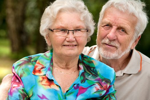 Elderly couple enjoying the spring in the park