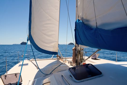 View of islands on the whiite luxury catamaran boat