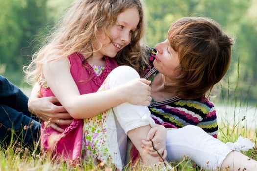 Mother and daughter have a happy time together