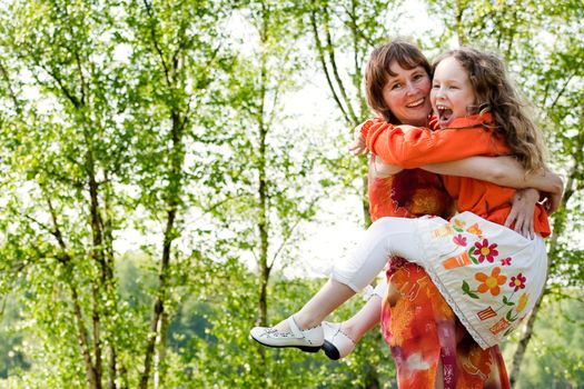 Mother and daughter have a happy time together