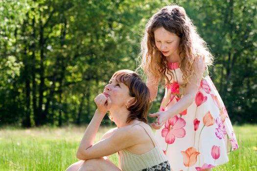 Mother and daughter have a happy time together