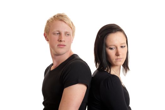 closeup of a sad looking young couple isolated on white