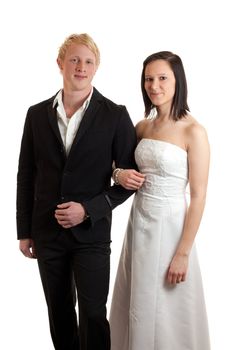 a young couple dressed up posing isolated on white