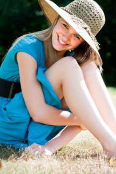 Teenage girl in fresh and happy mood outside in the park