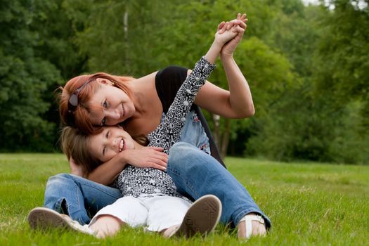 Mother and Daughter are happy in the park