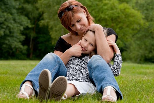 Mother and Daughter are happy in the park