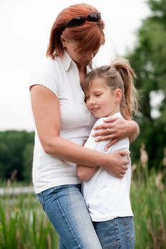 Mother and Daughter are happy in the park