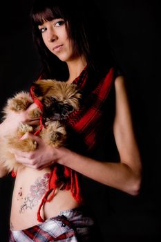 Brunette woman with a cute little pekingese