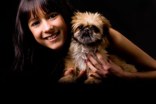 Brunette woman with a cute little pekingese