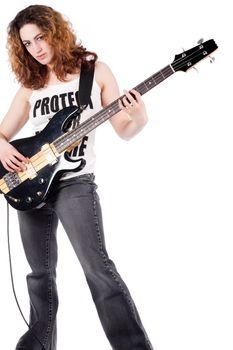 Young female bass guitar player specially isolated on white