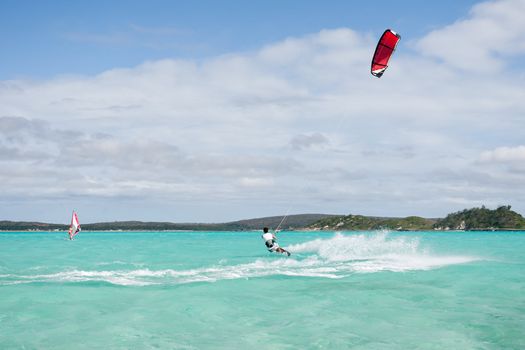 Male kitesurfer kitesurfing in the lagoon of Babaomby, Madagascar