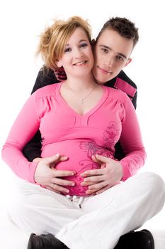 Young lovely caucasian couple expecting their baby