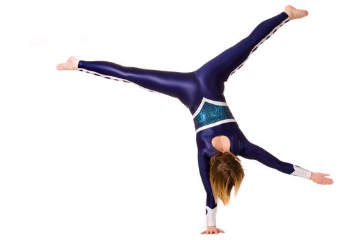 Young sportive girl with tricky gymnastic poses