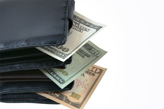 Three wallets with money showing income growth.