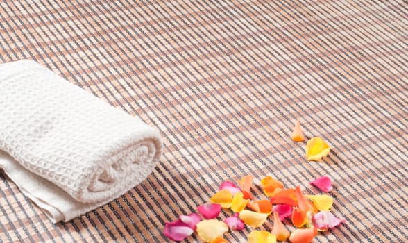 Studio shot of spa accessories, bamboo mat