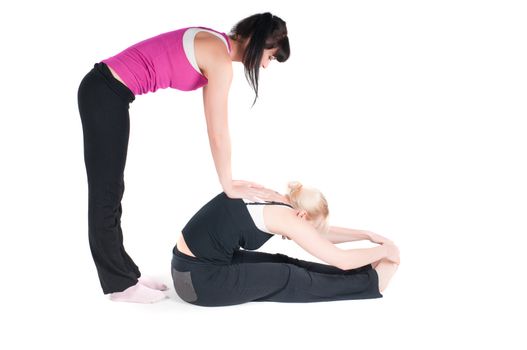 Shoot of two fitness instructors isolated on white