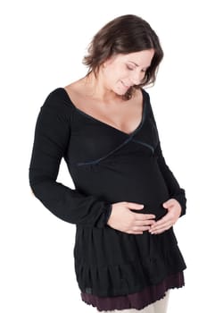 Portrait of pretty pregnant woman in black dress isolated on white